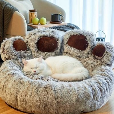 Coussin pour chat patte chat blanc dort